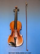 A late 19thC / early 20thC violin (label not legible) impressed Dresden to the 35.