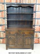 An oak two-drawer dresser (W122 x D45 x H183cm)