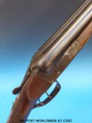 Unnamed Belgian 12 bore side by side shotgun with chequered semi-pistol grip and 30