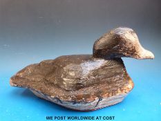 A carved wooden decoy duck, length 37 cm.
