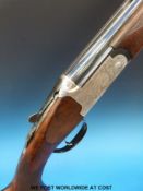 Lincoln No 2 28 bore over and under ejector shotgun with ornate engraving featuring scenes of dogs