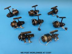 Seven Mitchell fixed spool fishing reels, models including 206, 206S, 321, 324, 440,