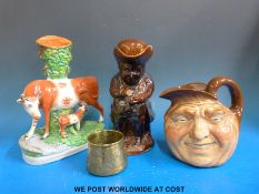 A Royal Doulton John Barleycorn vase, a treacle glazed Toby jug,