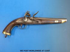 A flintlock service pistol with brass mounts and trigger guard,