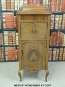 A walnut music cabinet (width 46cm)
