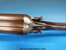 E M Reilly & Co 12 bore double barelled side by side hammer action shotgun with ornate engraving to