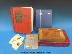 A Moveleaf album of all world stamps, a first day cover album,