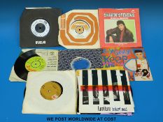 A large collection of over 1200x 7” singles in three boxes.