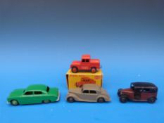 Four Dinky toys die cast model vehicles,