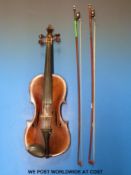 An early to mid 19thC violin labelled Giovanni Crancino Milan, inlaid purfling to table,