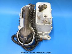 A military telephone marked MJM 1956 with plate marked D 60,