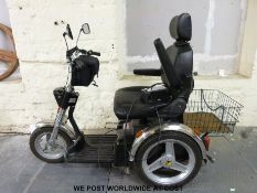 A TGA trike mobility scooter with charger