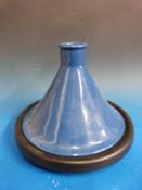 A Le Creuset cast iron and ceramic tagine/steamer.