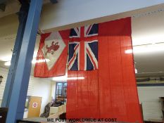 A Red Ensign flag together with a stern Jack with rampant lion (Clan line) and inscribed to edge