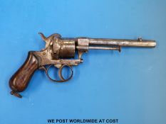 A 10mm rimfire six shot service revolver with walnut grip, c1850,