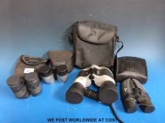 Four pairs of binoculars to include Hanoprik Nikon, together with a 10 x 25 monocular.
