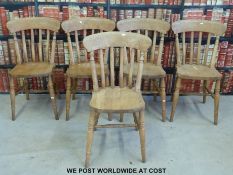 A set of six pine Windsor style kitchen chairs