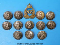 A set of military buttons by Firmin & Sons and a NZ Onward cap badge