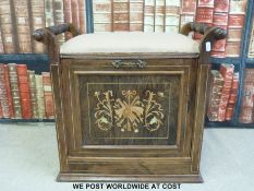 An inlaid rosewood and mahogany music seat/store full of sheet music