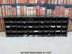 A metal military or similar style cubby hole unit (W130 x D23 x H44cm)