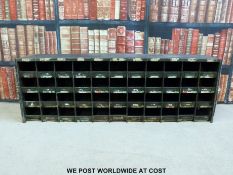 A wooden military or similar style cubby hole unit (W130 x D21.