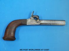 A Belgian 12mm single barrel percussion pistol with scrolling engraving surrounded by geometric