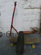 A vintage scooter and two vintage skate boards