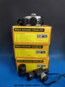 A Canon EOS 500 and 28 - 80 mm lens,