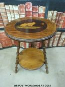 A 19thC inlaid table decorated with two chicks (diameter 38cm,