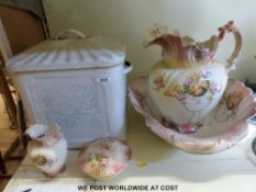 A jug and bowl set together with an enamel bread bin with countryside design