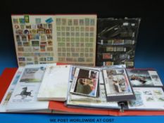 A crate of sundry first day covers, PHQ cards and other postcards etc,