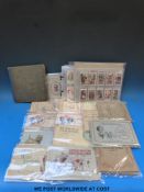 A quantity of cigarette cards in books and folders including Churchmans footballers players,