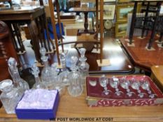A quantity of glassware to include Stuart and Edinburgh Crystal decanters, boxed vases,
