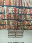 A vintage wrought iron double sided wine rack to take 144 bottles (height 126cm)