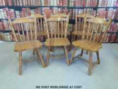 A set of six pine kitchen chairs