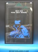 A framed silkscreen print 