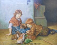 Oil on canvas of children playing with pet rabbits signed Wilson (39 x 49cm)
