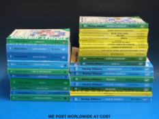 A quantity of Stanley Gibbons stamp catalogues