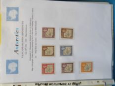 A collection of Falkland Islands Dependencies stamps in a ring binder