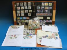 A stockbook of modern GB stamps, stamp club booklets,