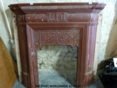 A 19thC / early 20thC cast iron fire surround named to rear T Elsley