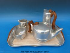 A Picquot ware retro tea set on a tray