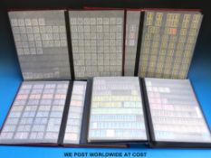 A stockbook of GB Machin stamps and three other modern GB stockbooks