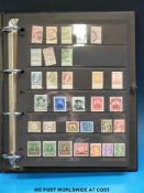 A collection of Belgium stamps in a binder
