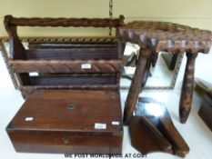 A mahogany writing slope, adzed table and magazine rack, brush set, mirror, etc.