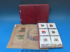 Four albums of military related c1930 largely Players cigarette cards,