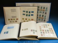 Three albums of Australia mint and used stamps 1902-2000 and a ring binder of Australian States and