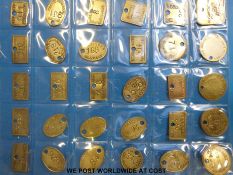 A good collection of 88 coal miners' tokens from Wales,