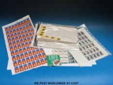 A quantity of whole and part sheets and mint blocks of GB QEII stamps