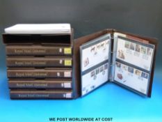 Six albums of GB first day covers together with spare page packs